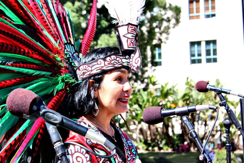 Photo Courtesy of Alliance San Diego. An indigenous woman speaks at a &ldquo;March for Dignity and Respect&rdquo; in San Diego