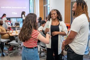 Narrative Innovators Lab Fellows talking with each other
